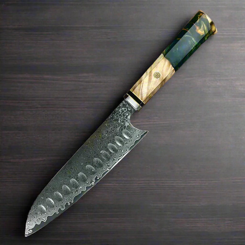 Decorative knife with a detailed handle on a dark surface